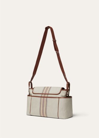 Bolso cambiador de rayas con maleta